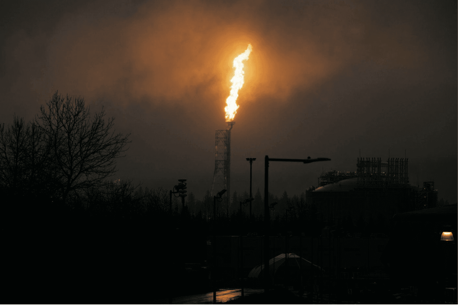 A gas flare against a dark sky.